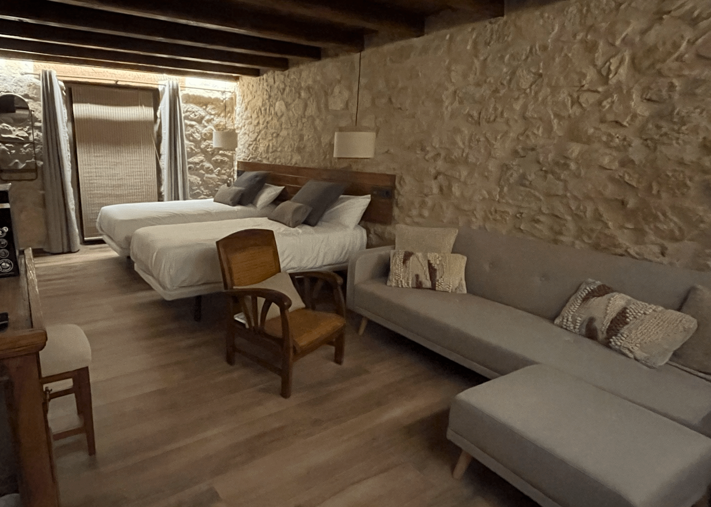The stone walls make the room original and cozy